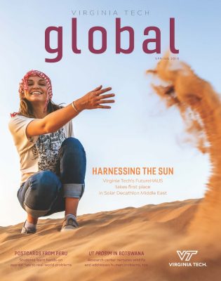 Spring 2019 cover image of a student in the desert throwing sand